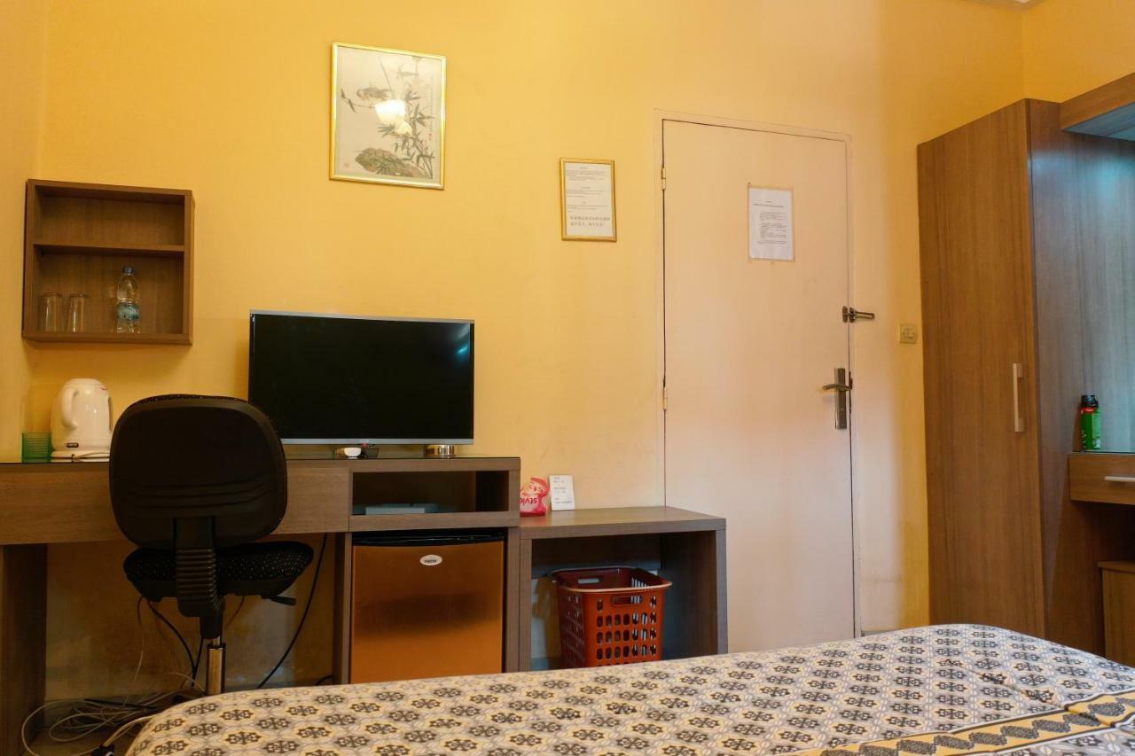 Petit Motel Beijing Abidjan Luaran gambar
